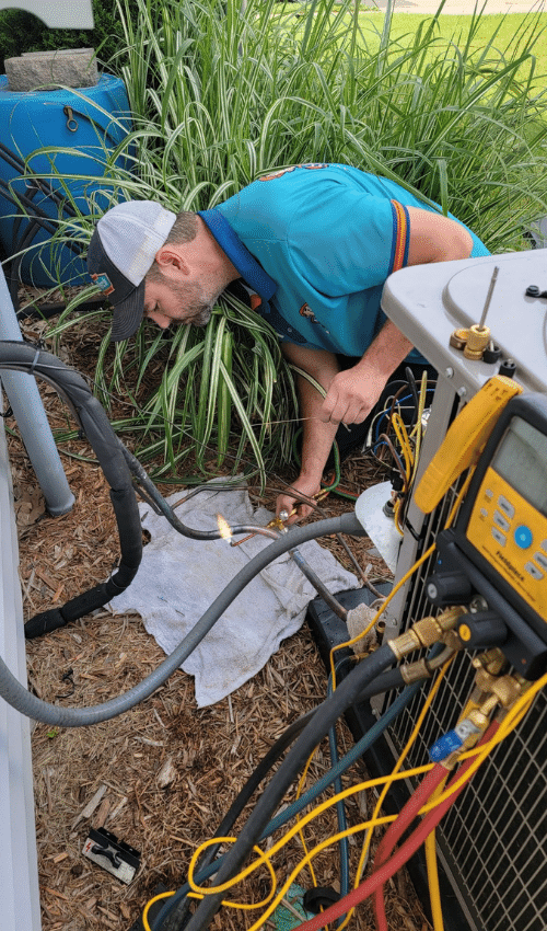 Tyler repairing outdoor AC Unit Tyler HVAC Service Technician